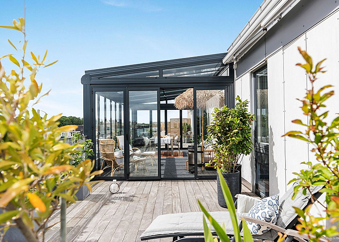 Glazen overkapping met hellend dak Horeca